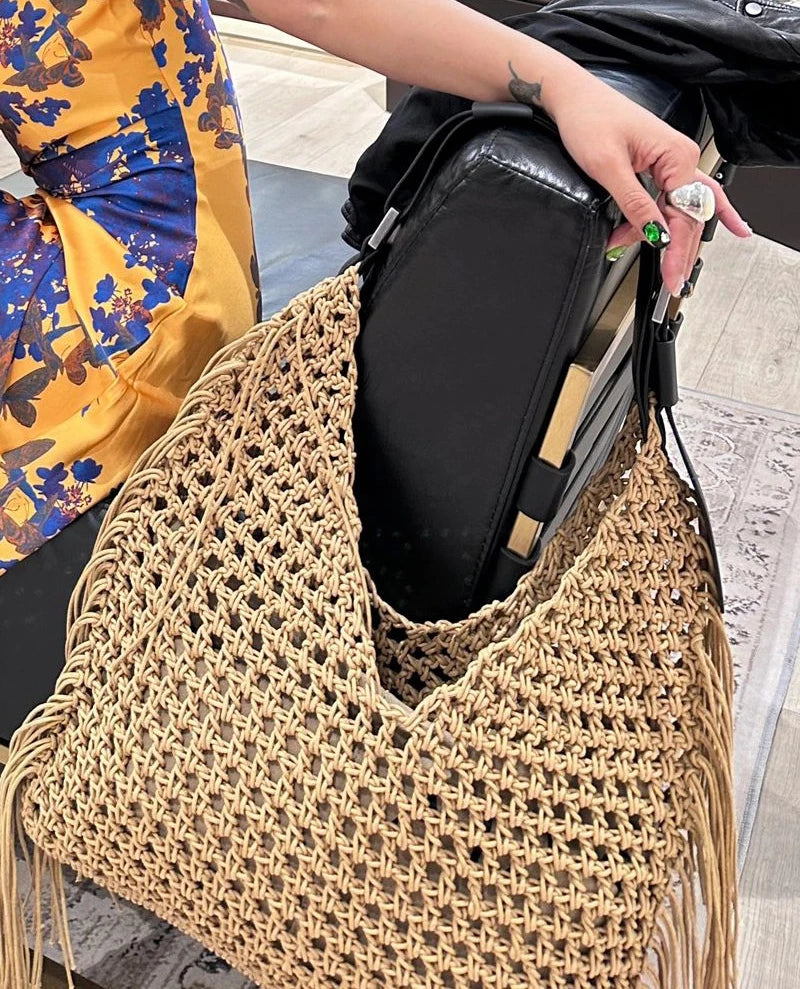 Bolsa de praia boêmia para mulheres bolsas e bolsas de grife de luxo 2023 nova em corda de náilon para tecer borla oca com decoração de bolso interno bolsa de ombro de grande capacidade alta qualidade Frete grátis