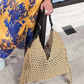 Bolsa de praia boêmia para mulheres bolsas e bolsas de grife de luxo 2023 nova em corda de náilon para tecer borla oca com decoração de bolso interno bolsa de ombro de grande capacidade alta qualidade Frete grátis